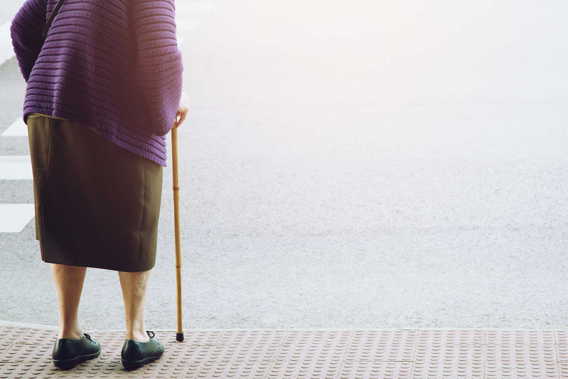 elderly-old-woman-with-walking-stick-stand-waiting-on-footpath-sidewalk-crossing-the-street elderly-old-woman-with-walking-stick-stand-waiting-on-footpath-sidewalk-crossing-the-street